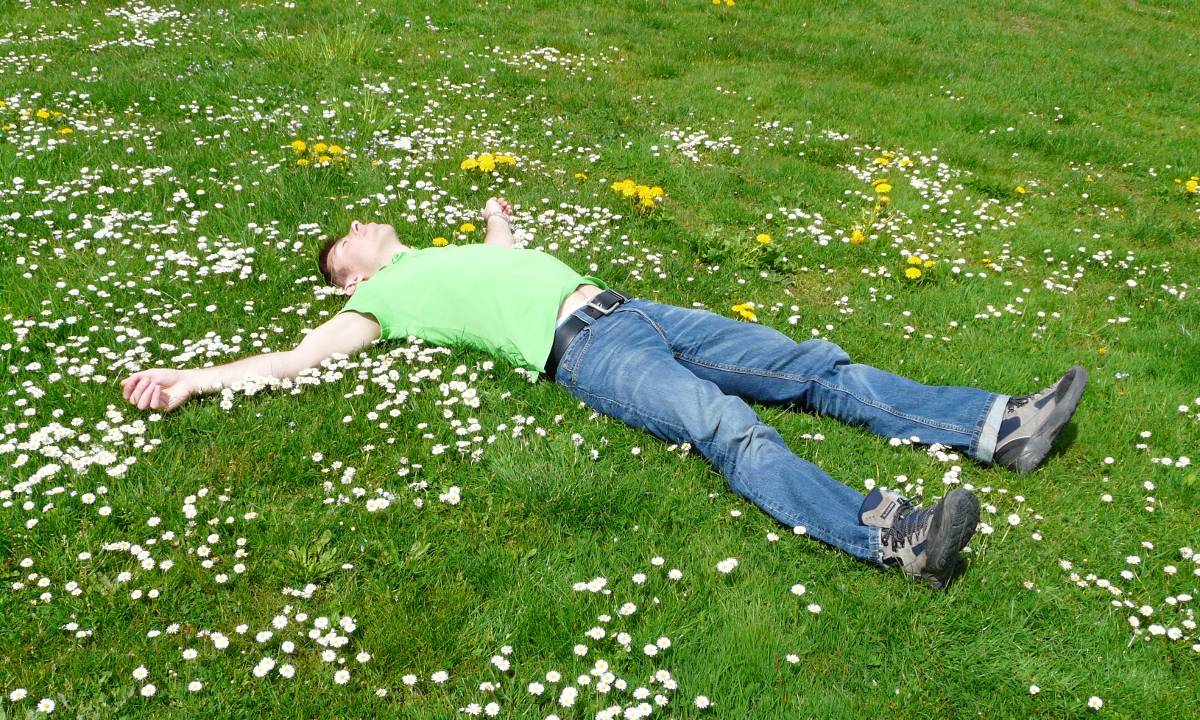 healthy sleep routine man on the green grass