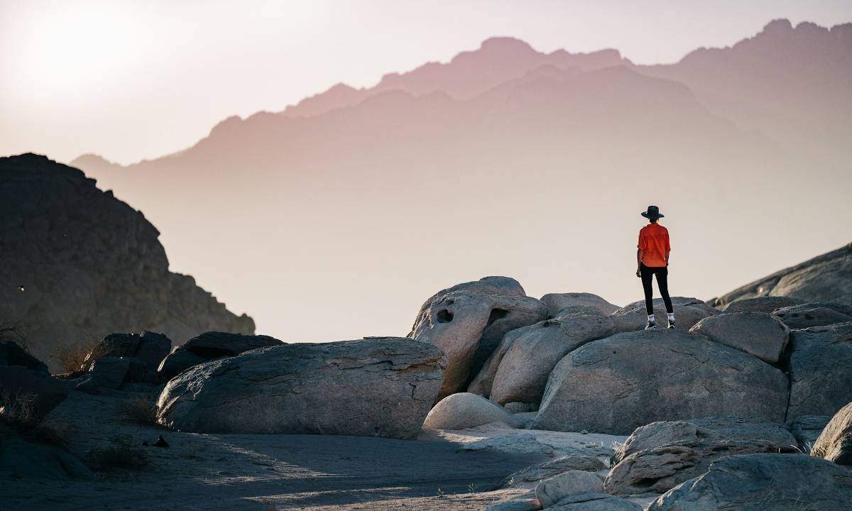 Traveling Solo - man on the rocks