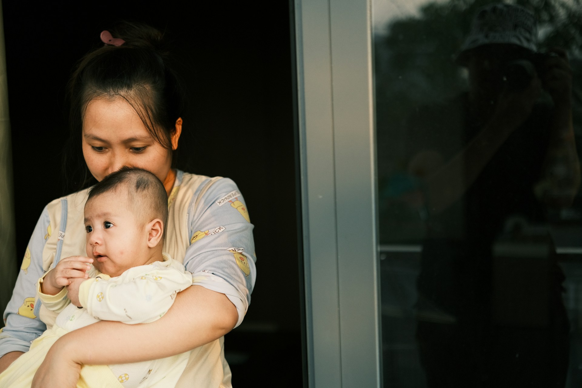 mother holding her child