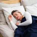 sleeping woman in a bed