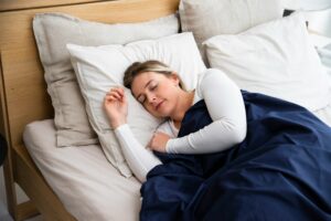 sleeping woman in a bed